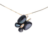 AM901-ciondolo-ribelle-mp-nera-oro-fronte