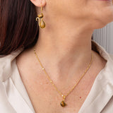 Charm Lisa a forma di gatto in occhio di tigre e argento